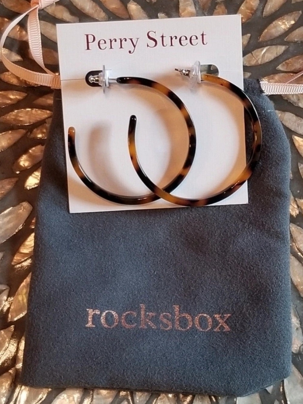 Perry Street Tortoise Hoop Earrings by Rocksbox